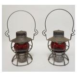 1111	TWO DRESSEL RAILROAD LANTERNS W/ RED GLOBES ONE IS WT COMPANY & ONE IS NJC. 15 IN H 	70	150	70	