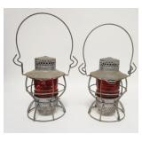 1120	2 NJC DRESSEL RAILROAD LANTERNS W/ RIBBED RED GLOBES  15 IN H 	70	150	25	PLEASE PAY ATTENTION F