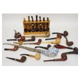 1127	LOT OF 25 PIPES. LOT INCLUDES A 17 1/2 IN PIPE W/ PORCELAIN ELEPHANT HEAD BOWL & A PIPE SHAPED 