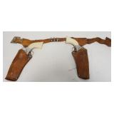 1159	ANTIQUE WESTER TOY CAP GUNS AND HOLSTERS WITH BELT, HOLSTER MARVEL, TEXAS KID, TOY GUNS MARVEL 