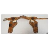 1169	ANTIQUE CHILDS GENE AUTRY HOLSTER WITH TOY CAP GUNS	50	100	25	PLEASE PAY ATTENTION FOR DAILY AD
