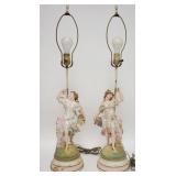 1209	PAIR OF FIGURAL LAMPS OF LADIES W/ FRUIT & FLOWERS. PAINT LOSS ON ONE BASE & SMALL CHIPS IN FLO