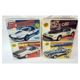 1020	LOT OF 4 MPC MODEL CAR KITS, CAMARO, MUSTANG, MONTE CARLO, INDY PACE CAR, KITS ARE POSSIBLY COM