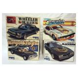 1026	LOT OF 4 MPC MODEL CAR KITS, STREET SPYDER, ROYAL KNIGHT, BLACKBIRD AND WHEELER DEALER, KITS AR