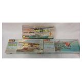 1060	MONOGRAM LOT OF 3 AIRPLANE MODEL KITS, CESSNA 180, PIPER TRI PACER. KITS ARE POSSIBLY COMPLETE,