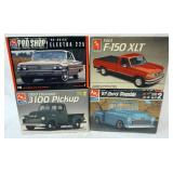 1102	LOT OF 4 AMT ERTL MODEL CAR AND TRUCK KITS. KITS ARE POSSIBLY COMPLETE, NOT GUARANTEED	50	100	1