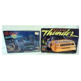 1127	LOT OF 2 MONOGRAM MODEL CAR KITS, ELVIRA MACABRE MOBILE AD DAYS OF THUNDER, SEALED.	50	100	10	P