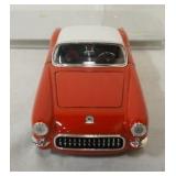 1193	1957 CHEVY CORVETTE DIE CAST METAL MODEL CAR KIT BUILT IN DISPLAY CASE 	50	100	10	PLEASE PAY AT