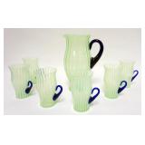 1040	FENTON GREEN OPALESCENT STRIP 7 PIECE LEMONADE SET WITH APPLIED COBALT BLUE HANDLES. PITCHER IS