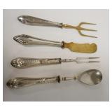 1072	GROUP OF FOUR 800 SILVER HANDLED UTENSILS, SOME DENTING ON HANDLES	50	100	25	PLEASE PAY ATTENTI