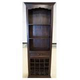 1129	NARROW WINE RACK W/ 1 DRAWER & BOOKCASE TOP W/ ONE DRAWER & BOOKCASE TOP. 26 IN W 75 IN H  13 N
