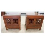 1149	PAIR OF SQUARE CARVED LAMP STANDS THE HAVE GLASS TOPS TWO DOORS & ONE DRAWER & FRET WORK SIDES.