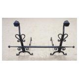 1151	PAIR OF LARGE WROUGHT IRON ANDIRONS W/ CROSS BAR. 28 IN H 24 IN DEEP THE CROSS BAR IS 46 IN W 	
