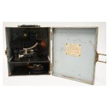 1165	KEUFFEL & ESSER SEXTON IN ORIGINAL METAL BOX W/ KEY. BOX IS 10 1/4 IN W 8 1.2 IN DEEP 11 3/4 IN