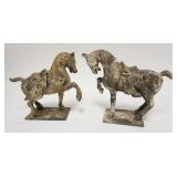 1168	PAIR OF CAST IRON ASIAN HORSES, LARGEST IS 11 IN LONG X 9 3/4 IN HIGH	50	100	20	PLEASE PAY ATTE
