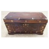 1200	CARVED ROSEWOOD ASIAN STORAGE CHEST W/BRASS MOUNTS & INLAY, INTERIOR HAS TRAYS, CHEST IS IN NEE