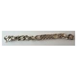 1242	STERLING SILVER HEAVY CHAIN BRACELET, MARKED 925. APPROXIMATELY 7 1/2 IN LONG	100	200	50	PLEASE