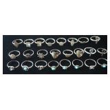1255	24 STERLING SILVER RINGS, APPROXIMATE WEIGHT INCLUDING STONES IS 1.435	25	50	10	PLEASE PAY ATTE