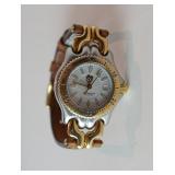 1256	TAG HEUER PROFESSIONAL 200 METERS WOMANS WATCH WITH TAG HEUER CUIR VERITABLE BAND	100	300	50	PL