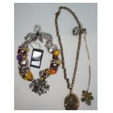 1257	2 OTAZU DESIGNER NECKLACES WITH SWAROVSKI CRYSTALS	100	200	25	PLEASE PAY ATTENTION FOR DAILY AD