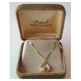 1275	NATURAL GOLD NUGGETS NECKLACE WITH 16 IN CHAIN AND CHARM WITH GOLD FLAKES. TOTAL APPROXIMATE WE
