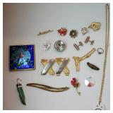 1279	JEWELRY LOT INCLUDING ENAMELLED COMPACT, 7 PINS, STAINLESS STEEL CUFF LINKS, 3 CRYSTAL PIECES, 