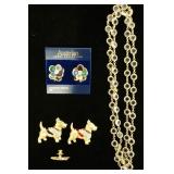 1064	LOT OF SWAROVSKI CRYSTAL JEWELRY LOT INCLUDES THREE DOG PINS, A PAIR OF AUSTRIAN JEWEL COLLECTI
