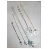 1077	LOT OF FIVE NECKLACES. LOT INCLUDES A *REAL COLLECTIBLES* BY ADRIENNE NECKLACE IN ORIGINAL BOX,