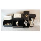 1080	LOT OF FOUR WRIST WATCHES. LOT INCLUDES TWO BY MAIN LINE TIME, VICTORIA WEICK & LUCORAL. ALL CO