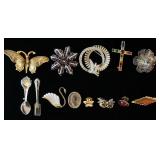 1082	LOT OF 13 PINS/BROOCH. LOT INCLUDES A BUTTERFLY MARKED SPAIN, A MINIATURE FORK, A MINIATURE SOU
