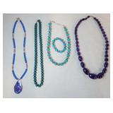 1090	LOT OF BEADED JEWELRY. LOT INCLUDES MATCHING NECKLACE & BRACELET W/ BLUE & SILVER COLORED BEADS