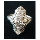 1108	ART DECO FILIGREE RING MARKED 14K IT IS APP. SIZE 6 3/4 