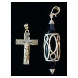 1109	LOT OF TWO GOLD PENDANTS INCLUDING A 10K CRUCIFIX PENDANT; 1.55 PENNYWEIGHT & A 14K MILOR GOLD 