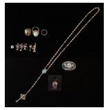 1113	LOT OF MOSTLY STERLING SILVER JEWELRY. LOT INCLUDES A ROSARY, SEVEN PENDANTS, THREE RINGS & A B