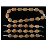 1135	STERLING SILVER CORAL OR MOONSTONE  TYPE JEWELRY, NECKLACE AND 2 BRACELETS 