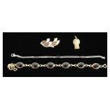 1143	LOT OF MISC JEWELRY INCLUDING GOLD FILLED MARY LOCKET, TORAH PIN, MONET BRACELET AND SARAH COVE