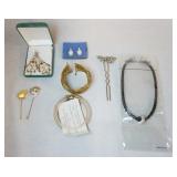 1157	LOT OF MISCELANIOUS COSTUME JEWELRY. LOT INCLUDES TWO PAIRS OF EARRINGS, TWO HAT PINS, TWO BRAC