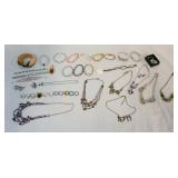 1182	LARGE ASSORTMENT OF COSTUME JEWELRY. LOT INCLUDES 11 RINGS, 15 BRACELETS, NINE NECKLACES ETC. A