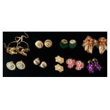 1195	LOT OF NINE PAIRS OF EARRINGS. ALL BUT THE DANGLING CAT EARRINGS ARE CLIP ON. 