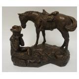 1001	AUSTIN PROD. COWBOY SCULPTURE, HORSE & COWBOY PLAYING A HARMONICA BRONZE FINISH PLASTER, 14 IN 