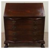 1015	CHARAK MAHOGANY SLANT FRONT DESK, HAS BALL & CLAW FEET FRONT & BACK, SERPENTINE FRONT, 36 IN WI