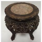 1024	SMALL CARVED ASIAN STAND W/INSET BROWN MARBLE, 14 IN HIGH, 12 IN TOP DIAMETER