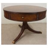 1031	MAITLAND-SMITH 3 DRAWER DRUM TABLE, HAS BANDED & PATTERNED VENEER TOP, BRASS FEET & CASTORS, 40