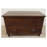 1052	DOVETAILED BLANKET CHEST W/DRAWER ON TURNED FEET, HAS CARVED LEAF DRAWER PULLS, 29 IN X 19 1/2 