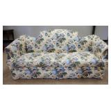 1055	DREXEL HERITAGE FLORAL UPHOLSTERED SOFA, SOME STAINING, APPROXIMATELY 85 IN WIDE