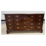 1062	STATTON 14 DRAWER LOW CHEST, TOP CENTER DRAWER HAS A SHELL CARVING, CHERRY, 65 3/4 IN WIDE X 34