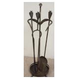 1149	IRON FIREPLACE TOOLS WITH DUCK AND ARROW HEADS AND WEBBED FEET AT BASE, 33 IN HIGH