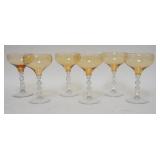 1185	SET OF 6 HONEY AMBER CHAMPAGNES , WITH UNUSUAL CLEAR STEMS
