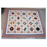 1225	QUILT W/DIAMONDS & SQUARES, FLORAL PRINTED BACK, 70 IN X 77 IN