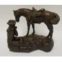 1001	AUSTIN PROD. COWBOY SCULPTURE, HORSE & COWBOY PLAYING A HARMONICA BRONZE FINISH PLASTER, 14 IN 